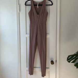 Babaton SOFT CONTOUR BUSTIER JUMPSUIT in mauve from aritzia